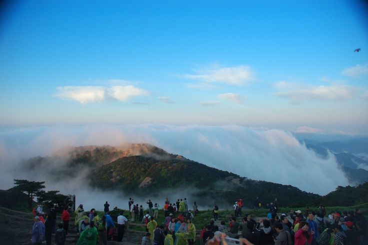 Morning mist and golden sunrise from Nandi Hills summit